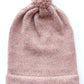 Handmade light pink baby hat in soft 100% baby alpaca wool with a pompom, foldable edge, and brown vegan leather label, offering warmth and comfort.